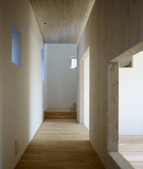 Small House with big Spiral Staircase by Hideshi Abe