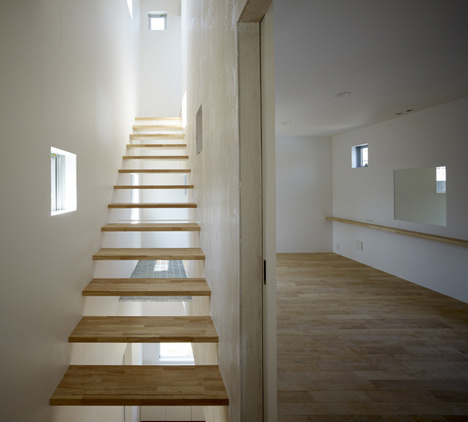 Small House with big Spiral Staircase by Hideshi Abe