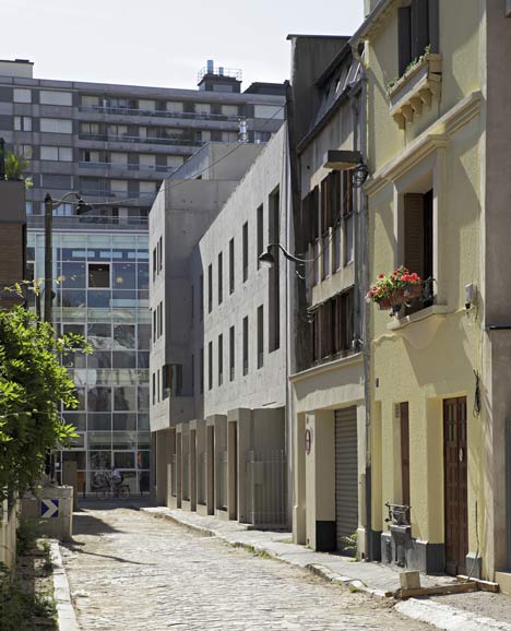 8 dwellings, 4 artist studios and 1 retail area by Charles-Henri