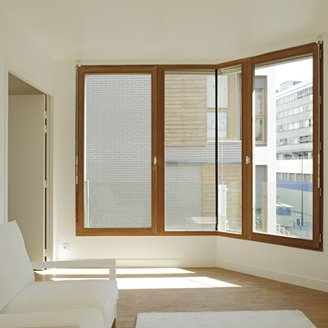 8 dwellings, 4 artist studios and 1 retail area by Charles-Henri