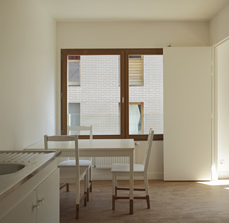 8 dwellings, 4 artist studios and 1 retail area by Charles-Henri