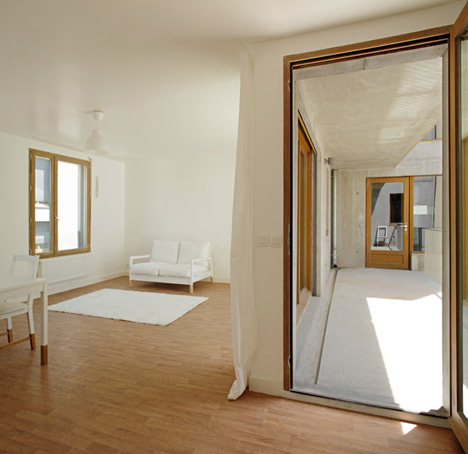 8 dwellings, 4 artist studios and 1 retail area by Charles-Henri
