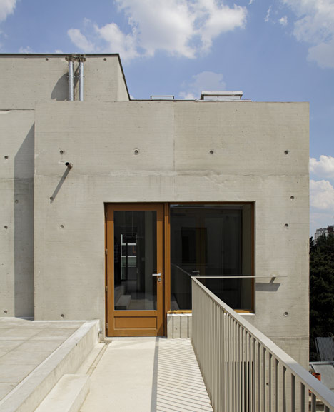 8 dwellings, 4 artist studios and 1 retail area by Charles-Henri