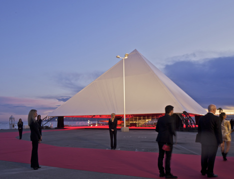 Seven screen pavilion by OMA for Kanye West