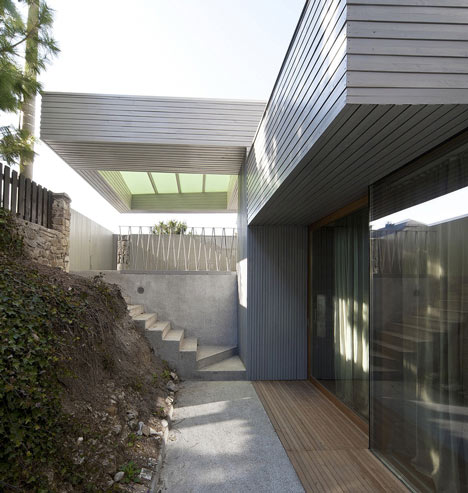 Villa T-Extension by OFIS Arhitekti