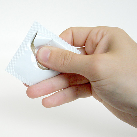 One Handed Condom Wrapper by Ben Pawle