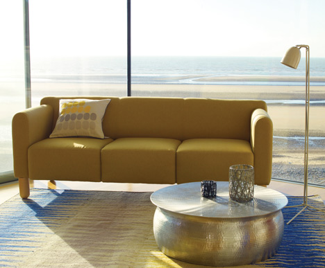 Orrico hammered aluminium coffee table (foreground)