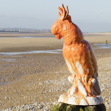 Persimmon ceramic parrot