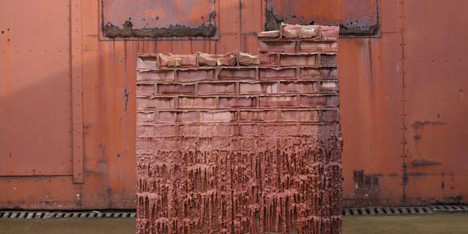 A Pound of Flesh for 50p by Alex Chinneck