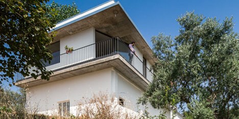 House over Warehouse by Miguel Marcelino