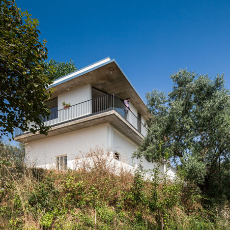 House over Warehouse by Miguel Marcelino
