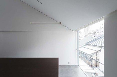 Japanese house designed around a dining table by Tsubasa Iwahashi Architects