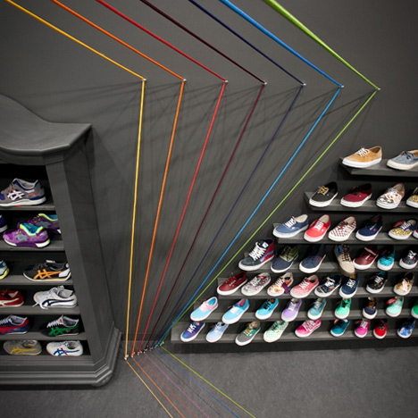 Run Colors trainers store by Modelina Architekci