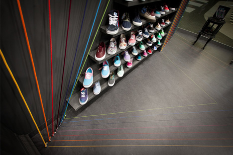 Run Colors trainers store by Modelina Architekci