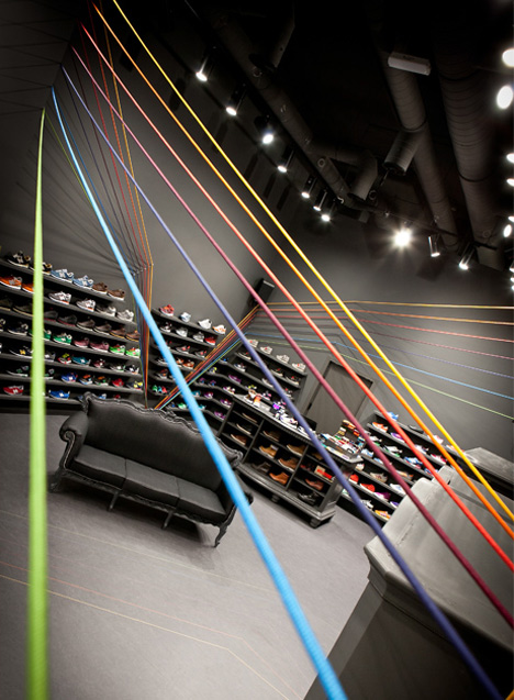 Run Colors trainers store by Modelina Architekci