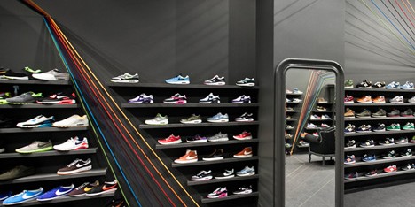 Run Colors trainers store by Modelina Architekci