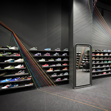Run Colors trainers store by Modelina Architekci
