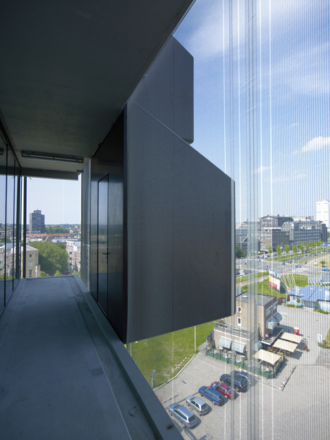 Schiecentrale 4b tower with protruding storage by Mei Architecten en Stedenbouwers
