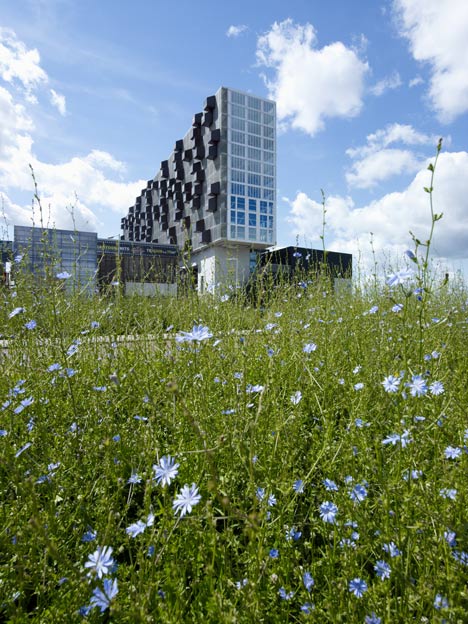 Schiecentrale 4b tower with protruding storage by Mei Architecten en Stedenbouwers