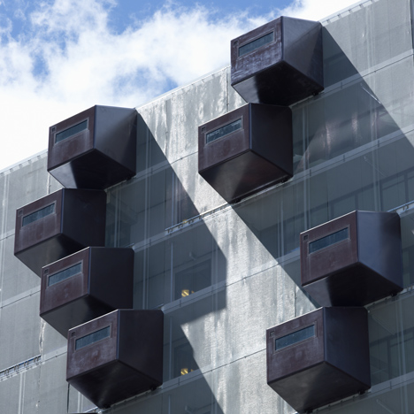 Schiecentrale 4B tower with protruding storage by Mei Architecten en Stedenbouwers