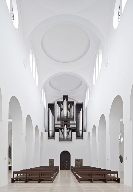 John Pawson's minimal St Moritz Church photographed during a choir rehearsal