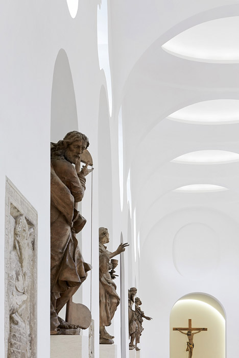 John Pawson's minimal St Moritz Church photographed during a choir rehearsal