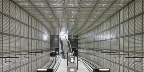Glowing glass blocks surround the Wilhelm-Leuschner-Platz S-Bahn station by Max Dudler