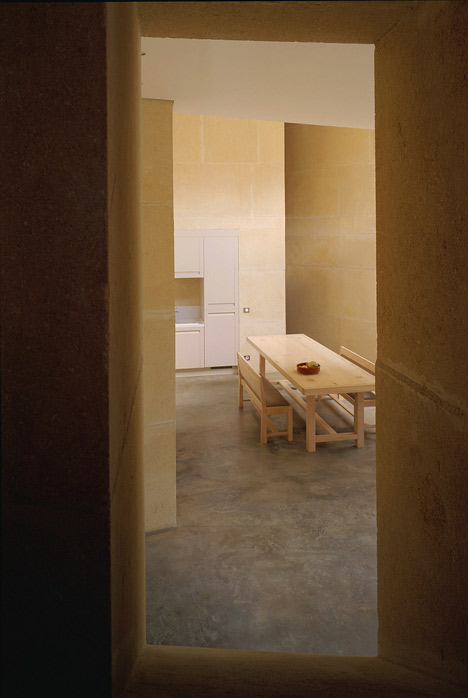 Stone house in Lyon's silk-weaving district by Perraudin Architecture