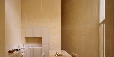 Stone house in Lyon's silk-weaving district by Perraudin Architecture