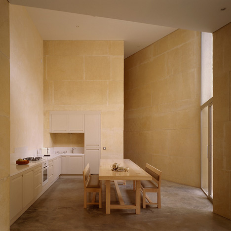 Stone house in Lyon's silk-weaving district by Perraudin Architecture