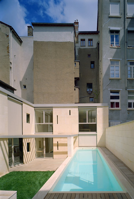Stone house in Lyon's silk-weaving district by Perraudin Architecture
