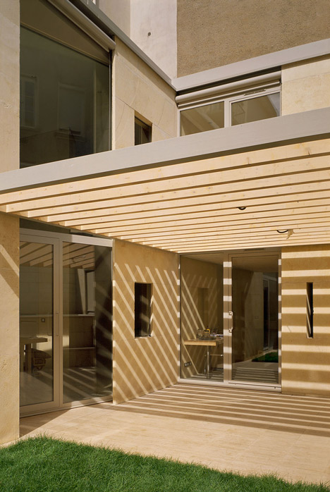 Stone house in Lyon's silk-weaving district by Perraudin Architecture