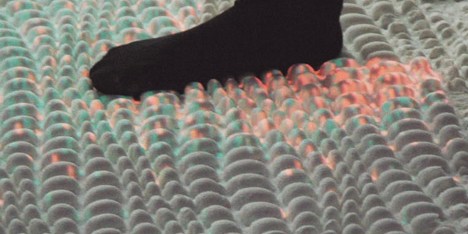 Surfaces that use hacked bacteria to detect dirt or clean themselves