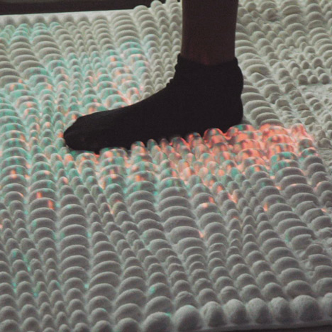 Surfaces that use hacked bacteria to detect dirt or clean themselves