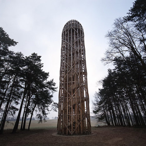 Timber observation tower shaped like “a cucumber” by Mjölk Architekti