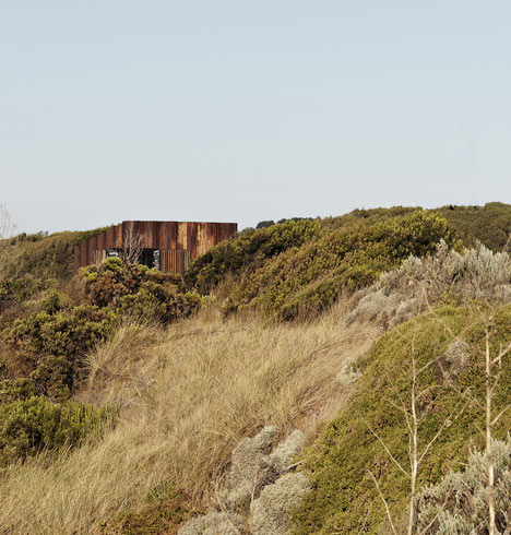 Third Wave Kiosk built from weathered steel piles by Tony Hobba Architects
