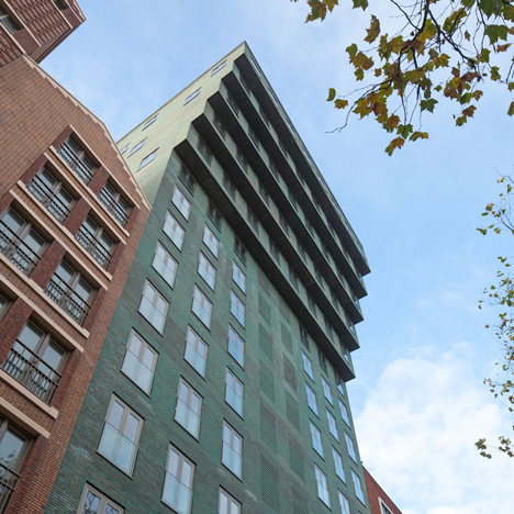 Turquoise tower by NL Architects that staggers back to create sunny balconies