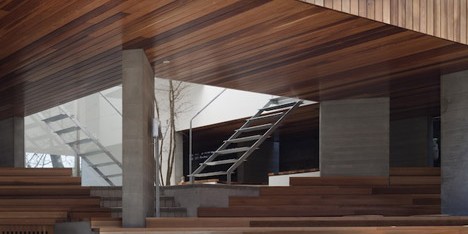 House by Kazuhiko Kishimoto with a public seating deck and gallery underneath