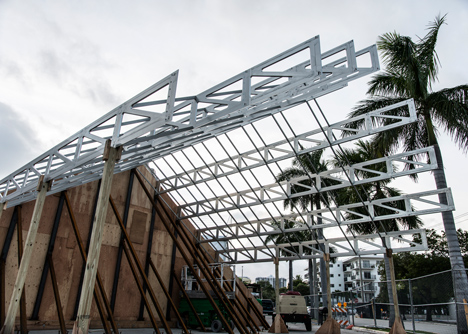 Roof over a pile of sand forms entrance to Design Miami 2013