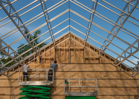 Roof over a pile of sand forms entrance to Design Miami 2013