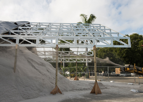 Roof over a pile of sand forms entrance to Design Miami 2013