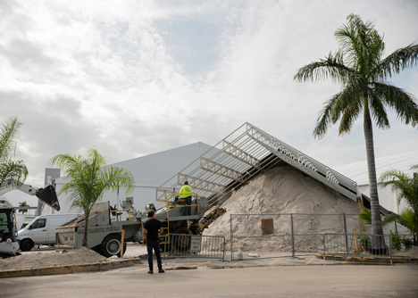 Roof over a pile of sand forms entrance to Design Miami 2013