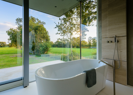 Dutch studio Inbo hides a transparent house behind a grove of trees