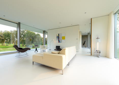 Dutch studio Inbo hides a transparent house behind a grove of trees