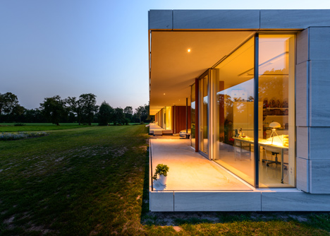 Dutch studio Inbo hides a transparent house behind a grove of trees