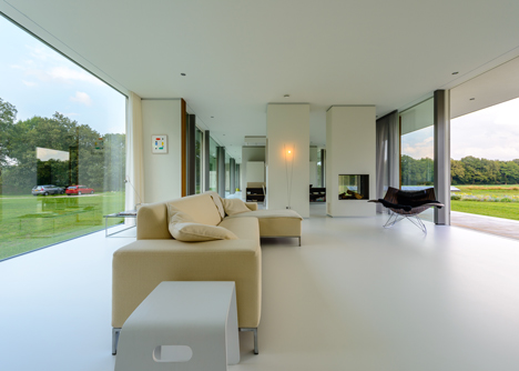 Dutch studio Inbo hides a transparent house behind a grove of trees