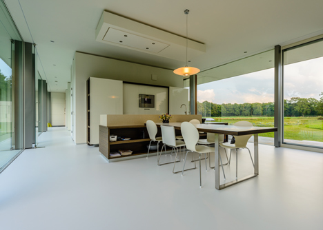 Dutch studio Inbo hides a transparent house behind a grove of trees