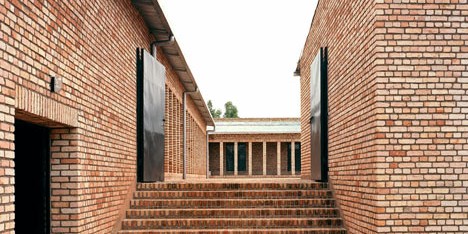 Education centre in Rwanda built from brick and wicker by Dominikus Stark Architekten
