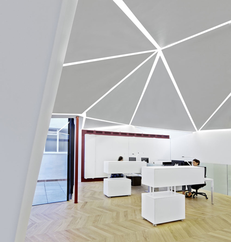 Great James Street Office extension with a faceted copper roof by Emrys Architects