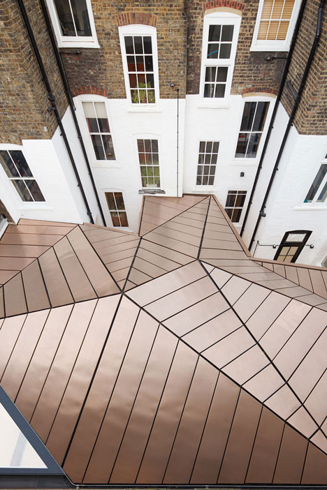 Great James Street Office extension with a faceted copper roof by Emrys Architects